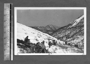 Hiking through snowy mountains, Sichuan, China, ca.1941