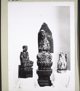 Figures of deities, including the deity of mercy