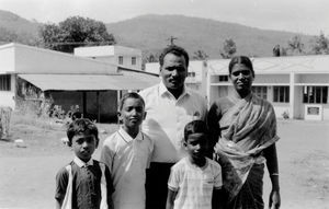 Kalrayan Hills, South India. Unidentified family (?) in front of a new girls hostel at Kariyalu