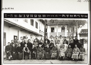 "Final exams of 4 students, each holding their diploma, in Pyangtong with Mr and Mrs Miss. Wyder