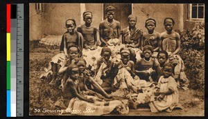 Seated women and children sewing, Angola, ca.1920-1940