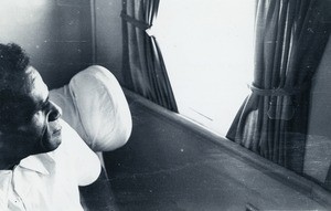 Rev. Xowié Madine, in a plane