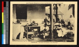 Missionary sister and seated children sewing clothing, Cameroon, ca.1920-1940