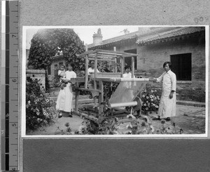 Weaving on a loom at Harwood Bible Training School, Fenyang, Shanxi, China, ca.1936-37