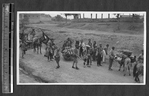 Supply train on road, Jinan, Shandong, China, 1928