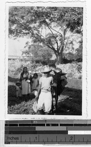 Family setting out on a journey, Carrillo Puerto, Quintana Roo, Mexico, ca. 1946