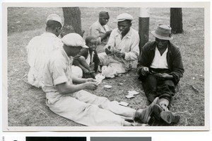 Workers of a goldfield playing at cards, South Africa