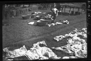 African boy at laundry work, Manjacaze, Mozambique, ca. 1933-1939