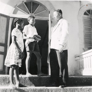 Reverend Razafimaharavo of the Ziona's Church in Mahajanga with his two children, in Madagascar