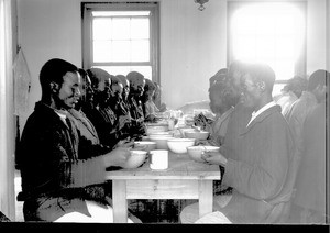 Students of the school for evangelists having lunch, Ricatla, Mozambique, ca. 1907