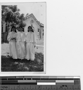 Maryknoll Sisters standing under the trees at Jiangmen, China, 1949