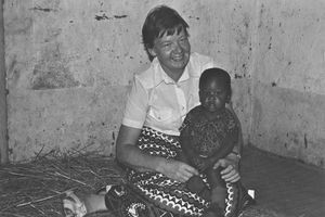 ELCT, Karagwe Diocese, Tanzania. Missionary Gudrun Vest with a small boy. (son of a pastor), Bu