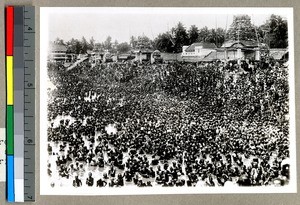 People washing themselves in a sacred river, Vārānasi , India, ca. 1920