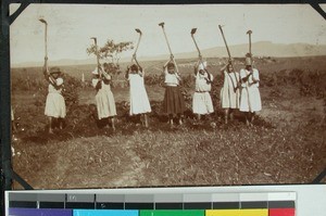 Zulu girls on the field with their hacks, South Africa