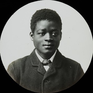 Boy with coat and tie, Congo, c. 1900-1915