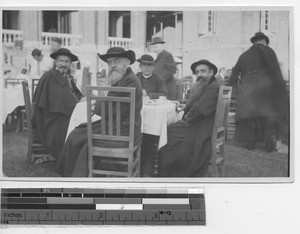 Bishop with priests at the Mission at Fushun, China