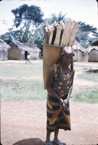 Woman carrying fire wood, Bankim, Adamaoua, Cameroon, 1953-1968