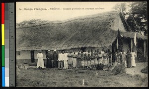 Missionary father standing with new confirmands, Congo, ca.1920-1940