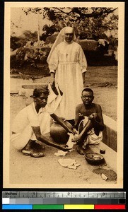 Missionaries aiding a leper, Kollam, India, ca.1920-1940