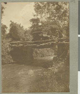 Car on bridge, Chogoria, Kenya, ca.1924