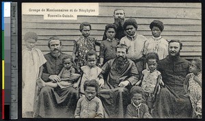 Missionary fathers with indigenous Christian children, Papua New Guinea, ca.1900-1930