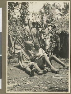 Boy being taught to read, Eastern province, Kenya, 1937