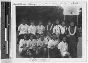 Maryknoll Sisters Miriam Therese and Rose Eileen with basketball champs, Punahou, Honolulu, Hawaii, 1946