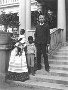 Missionary Viggo Moller and mrs. Ada Moller with their indian foster children