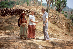 Missionary Tove Madsen with her assistant welcomes Secretary General Jørgen Nørgaard Pedersen t