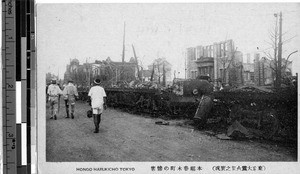 Damage to a train and buildings, Tokyo, Japan, ca. 1920-1940