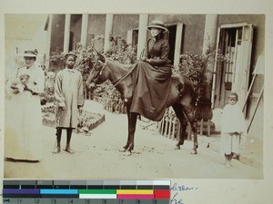 Valborg Anderssen on a donkey's back, Antsahamanitra, Antananarivo, Madagascar, ca.1896