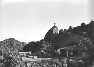 Tiyagadrug, Tamil Nadu, South India, 1981. The cross erected on a large rock behind the church