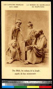 Children in traditional clothes with a male missionary, Rajasthan, India, ca.1920-1940