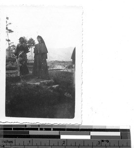 A Maryknoll Sister with a woman and child at Dongshi, China, 1939