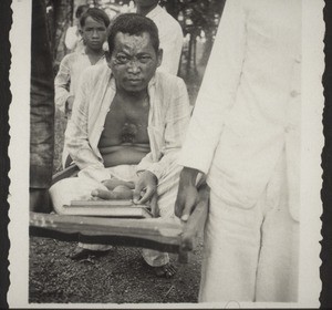 Job (Hiob) was carried by his brothers to the meeting and baptised here. In front you see his Bible (New Testament). He never allows himself to be parted from it. Boentok 1936