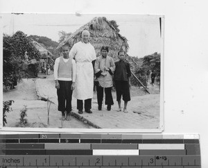 Dr. Sherry with patients at the leprosarium at Jiangmen, China, 1936