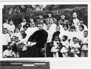 Maryknoll Sisters and priest at the orphanage at Luoding, China, 1934