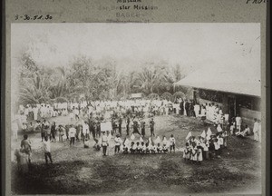 Childrens' games on the school playground which is decorated for the festival