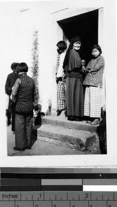 Maryknoll Sister entering doorway, Kaying, China, ca. 1930