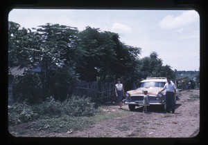 Family outside their home