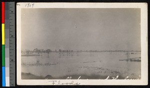 Flood waters covering a field, China, ca.1904