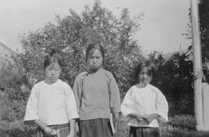 Three girls crying, because they were not allowed to be baptized or confirmed this time. Kwanti