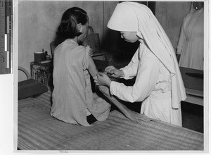 A Chinese Sister and patient at Taishan, China, 1948