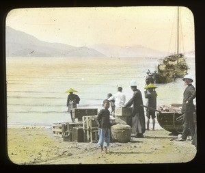 Priest wearing a pith helmet waiting to board a ship, China, ca. 1918-1938