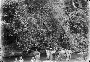 African men at the riverbank, Tanzania, ca.1893-1920