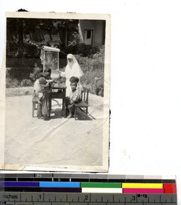 A Maryknoll Sister and her class at Dongshi, China, 1948