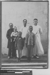 Fr. Cairns with his catechist and family at Huazhou, China, 1924