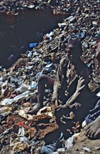 Mission at the bottom - City Mission in Madagascar. The large landfills almost function as a co