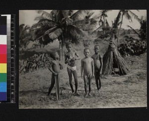 Boys by fetish house, Ghana, 1926