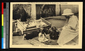 Missionary sister feeding orphans, Cameroon, ca.1920-1940